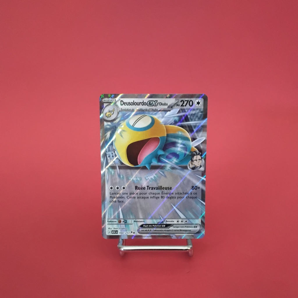 Carte Pokemon Deusolourdo EX d'Okuba 164/217 - ME 02.5- Héros Transcendants - État Near Mint- (FR)